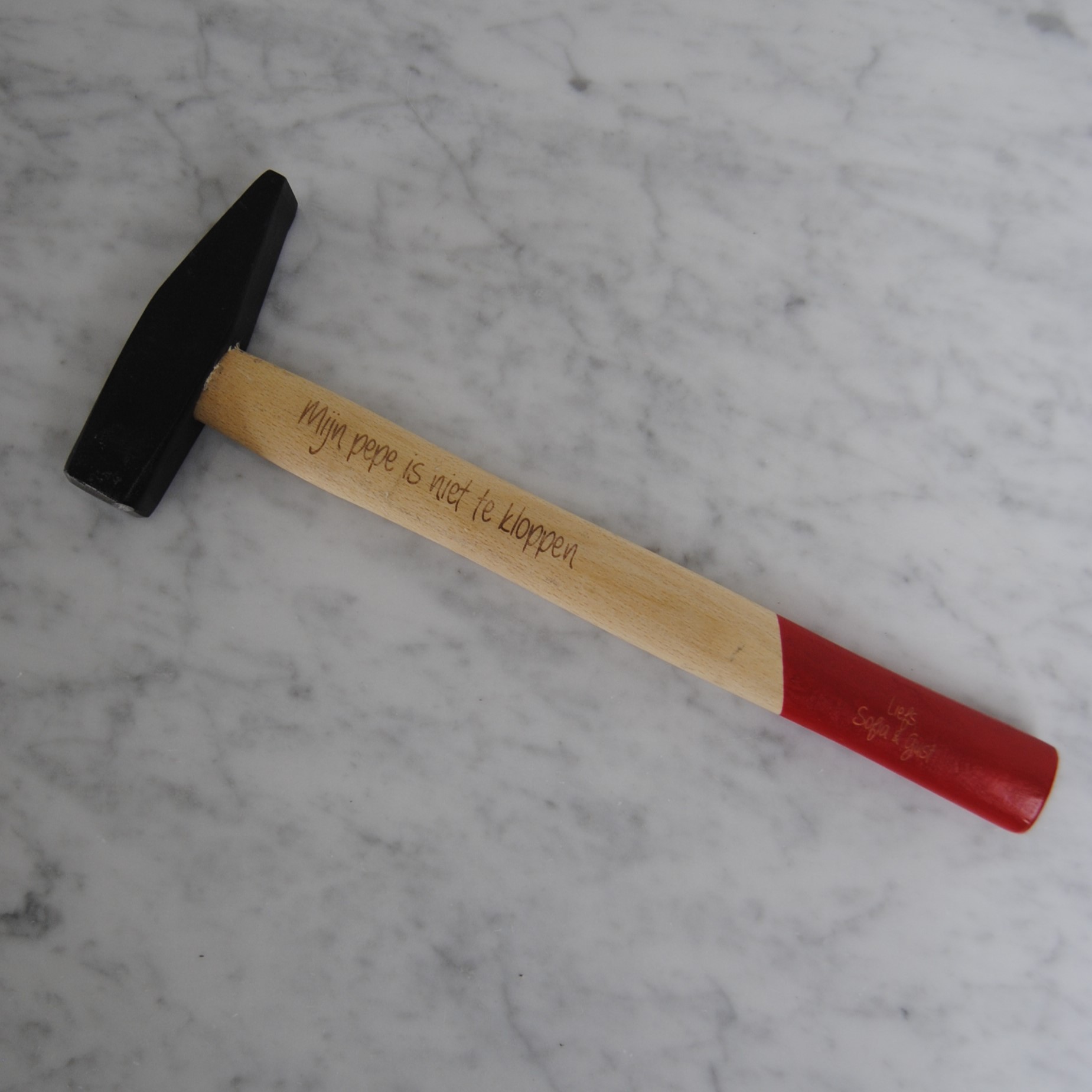 Houten hamer met tekst